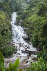 Naklejka na ściany i meble Nature waterfall after rain