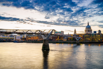 Millenium bridge and St.Paul's cathedral with beautiful blue sky at dusk