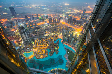 Fototapeta na wymiar Dubai downtown viewed through the glass of skyscraper