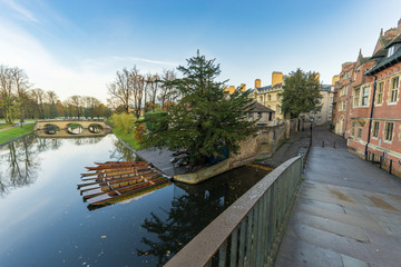 Punting boats at the river cam in Cambridge viewed from the bridge 