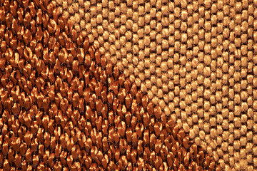 Closeup of brown, gold, tan textile