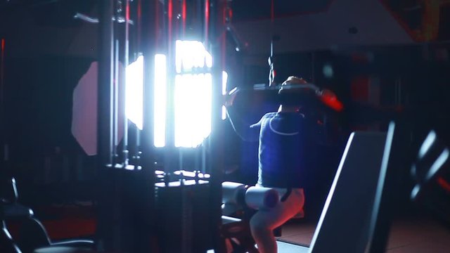 Athlete swinging on the simulator.