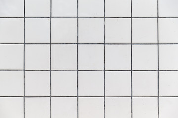 White Tiles wall background texture.