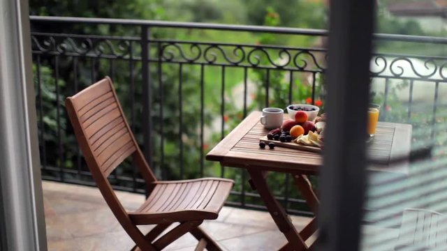 useful breakfast of fruits on the terrace of the villa