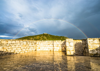 Sveta Nedjelja mountain near Hvar with beautiful rainbow, Croatia