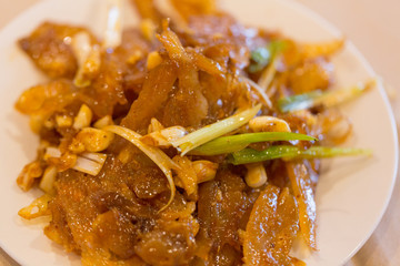 Authentic Sichuan style spicy Chinese food on the table, closeup.