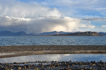Western Tibet. Sacred lake Dangra (Dang Ra Gyu Tso) in summer evening in cloudy weather