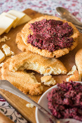 Mchadi - traditional Georgian cornbread traditionally eaten with lobio, suluguni cow cheese and beetroot pkhali appetizer with walnuts and spinach. Vegan vegetarian healthy food for lunch or dinner