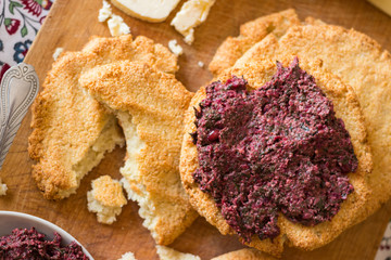 Mchadi - traditional Georgian cornbread traditionally eaten with lobio, suluguni cow cheese and beetroot pkhali appetizer with walnuts and spinach. Vegan vegetarian healthy food for lunch or dinner