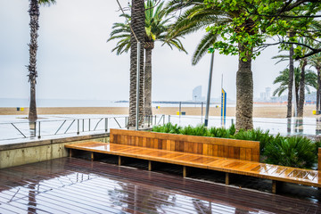 Promenade near Barceloneta beach at rainy day