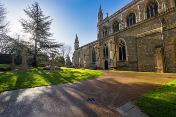 Fototapeta na wymiar Cathedral and Abbey Church of Saint Alban at sunrise in St.Albans, UK