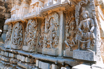 Ornate wall panel reliefs depicting Hindu deities, west side, Hoysaleshwara temple, Halebidu, Karnataka