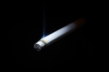 Cigarette on a dark background