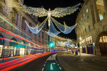 Regent Street with light trails and christmas decoration, central London