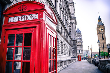 Red telephone box near Big Ben. London, England
