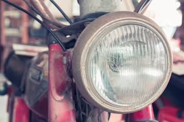 Fototapeta premium Headlight lamp vintage classic motorcycle - vintage effect style pictures