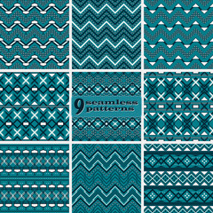 Set of blue and white seamless geometric patterns with complex zigzag