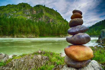 Stone heap on Katun river coast in Altai mountains. Chemal, Altay Republic, Siberia, Russia.