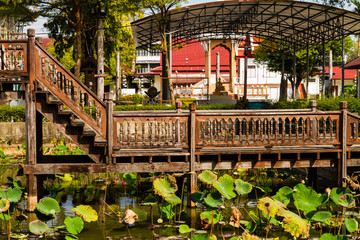 Fototapeta premium Thai wooden temple architecture Wat Thung Si Muang ,Ubon ratchatani province.Thailand