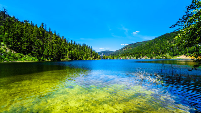 The crystal clear waters of Allison Lake along Highway 5A between the towns of Merritt and Princeton in British Columbia, Canada
