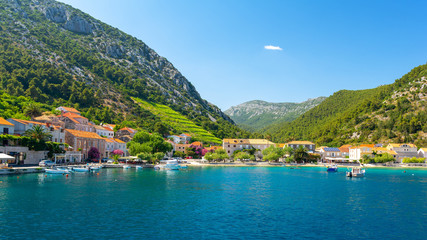 Fototapeta na wymiar view on Trstenik village from the sea, Peljesac peninsula, Dalmatia, Croatia