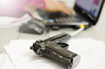 The gun is placed on a desk