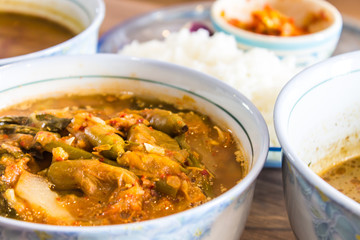 Thai traditional sour soup in the cup Put on a table ready to eat