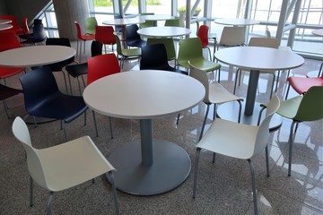 Colorful plastic chairs and tables 
