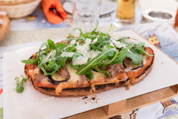 Bruschetta with rocket and tomato mazzarella