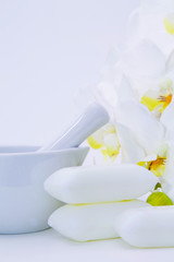soaps, bowl and orchid. spa and relaxation concept