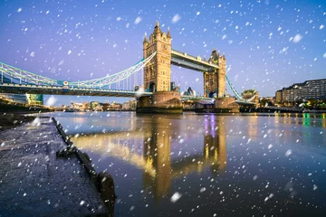Fotobehang Tower Bridge with falling snow. Winter  in London © Pawel Pajor