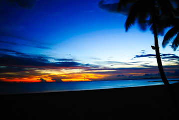Enjoying sunset time in Denarau Island Fiji with orange blue sky and cloud for family vacation and couple honey moon retreat