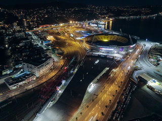 Highway, Train Lines And Stadium Headed Into Wellington City New Zealand, Night Aerial 