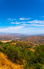 Fototapeta na wymiar beautiful view of the mountains in the region of Andalusia, houses and farmland on the slopes of mountains