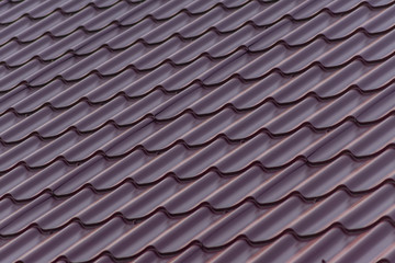 close up of red plastic roof tile for background