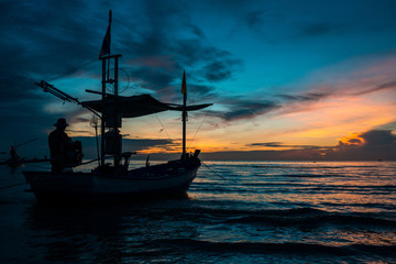 Boat at the coast at sunrise