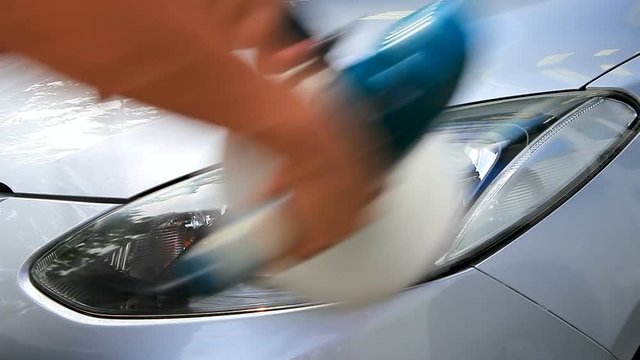 working man polishing on car color making