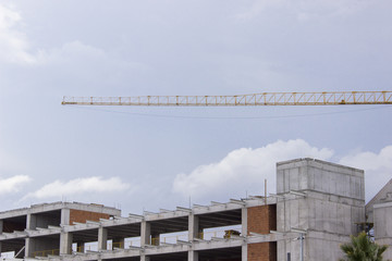 Perspective wide shot of reinforced construction site of soccer stadium with over cast sky in Izmir at Turkey