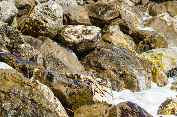 Amazing sea with blue summer wave and rocks, relaxing view of rocks and water