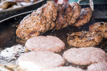 Fresh home made hamburgers on grill