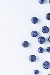 Fresh blueberry on a white wooden table