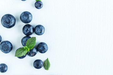 Fresh blueberry on a white wooden table