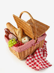 Wicker basket filled with a summer picnic