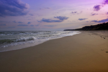 Fototapeta premium yellow sand beach near the blue beautiful sea