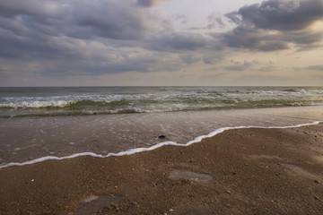 beautiful yellow sandy beach near the blue sea