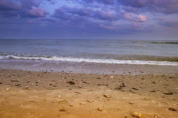 beautiful yellow sandy beach near the blue sea