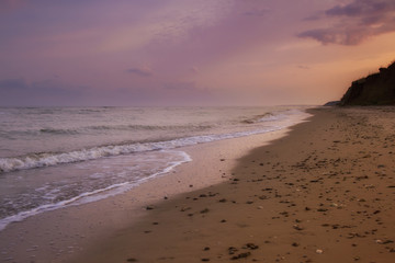 yellow sand beach near the blue beautiful sea