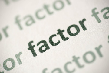 word factor printed on paper macro