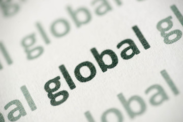 word global printed on paper macro