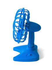 Blue plastic fan with batteries, propeller and protective grille. Side view. Isolated on white background